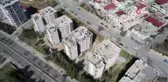 Kahramanmaraş'ta ağır hasarlı binaların yıkımı sürüyor