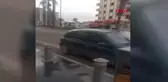 Tarsus'ta yıkımı yapılan bina çöktü, kepçe operatörü yaralandı