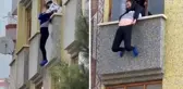 İkinci kattan aşağı atlayan kadın son anda yakalandı