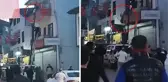 Balkondan düşen down sendromlu kız çocuğunu esnaf havada yakaladı