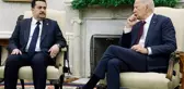ABD Başkanı Biden, Irak Başbakanı ile görüşürken saatiyle oynadı