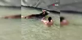 Canını hiçe saydı, sulama kanalına düşen ineği kurtardı