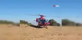 Dağlık alana düşen paraşütçü ambulans helikopterle hastaneye sevk edildi