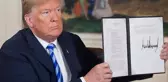 Trump'ın koltuğa oturur oturmaz imzaladığı kararname iptal edildi