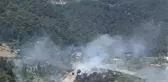 İzmir'in Kemalpaşa ilçesinde çıkan orman yangınına müdahale ediliyor