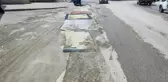 Belediyenin yapmadığı yola esnaftan ilginç çözüm