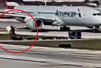 In the United States, the engine of a plane waiting on the tarmac swallowed and shredded a baggage cart.