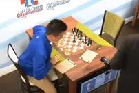 The chess master who punched a female reporter after suffering a defeat was arrested.