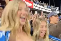 Two women drew attention by showing their breasts to the cameras during a baseball game.