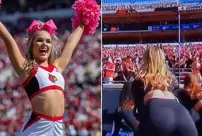 The cameraman who closely filmed the cheerleaders dancing at the football match received backlash.