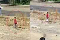 The little boy suddenly stopped while walking down the road! The reason made him proud.