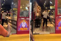 A Korean with a baseball bat charged into a Turkish kebab shop.