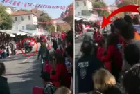 The motorcycle police officer who collided with his colleague couldn't stop and crashed into the crowd.