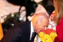 U.S. President Joe Biden bit three babies at the White House Halloween party.