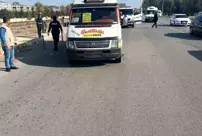 Two people were trapped under the minibus when it stopped in a place where passenger drop-off is prohibited.