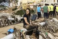 In Spain, where the death toll from the flood disaster has exceeded 200, 2,000 people are unaccounted for.