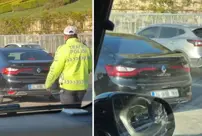 The police officer noticed the driver's trick and immediately pulled him over.