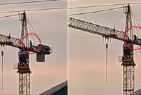 He prayed at a height of 60 meters on the crane.