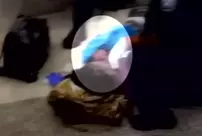 The young mother gave birth while waiting in line for her ticket at the airport.