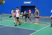 The athlete who lost the match kicked his opponent in the face.