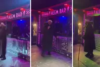 The preacher who went to the nightclub took the microphone on stage and gave a sermon.