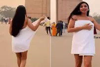 The model dancing with a towel in front of the Indian Gate drew reactions.