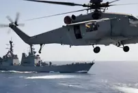 Warning shots from a Russian ship to a German military helicopter.