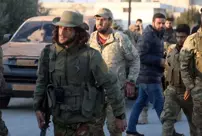 Armed opposition forces have entered Hama, and regime forces are withdrawing to Homs.