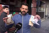 They will no longer carry bundles of cash! The era of using Turkish Lira for shopping has begun in Aleppo.