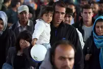 Germany has suspended the asylum applications of Syrian refugees.