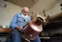 The 81-year-old master is fulfilling requests from abroad for handcrafted copper samovars.