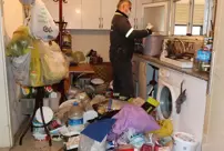 The house that was cleaned up following a smell complaint yielded 4 truckloads of garbage.