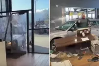 The angry driver crashed into the dealership when he couldn't get his money back.