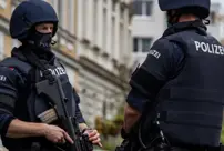 In a police raid conducted in Austria, long-barreled weapons and illegal Nazi symbols were found.