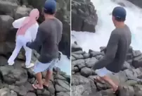 The young girl became a victim of the giant waves while taking photos on the cliffs.