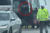 The photo of President Erdoğan stopping the bus.