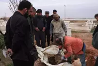 Another mass grave has been discovered in Syria.