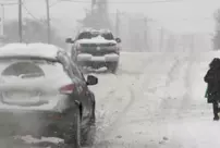 A winter storm claimed 6 lives: A man was found frozen to death at a bus stop.