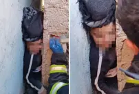 The child's head got stuck between two walls while playing hide and seek.