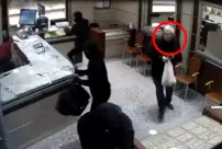 The customer took advantage of the thieves' distraction to save himself.