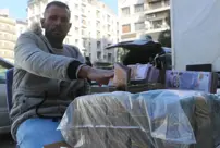 In Syria, money changers are exchanging bundles of cash on the streets.