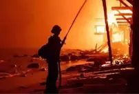 The death toll from the wildfires in California has risen to 28.