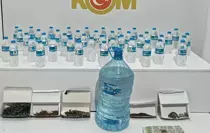 Samsun'da Kaçak İçki ve Uyuşturucu Operasyonu: 40,5 Litre Alkollü İçki ve Esrar Ele Geçirildi