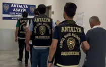 antalya-da-kuyumculara-sahte-altin-satan-2-za-18784542_amp.jpg