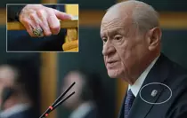 bahceli-nin-yuzugu-ve-rozeti-dikkat-cekti-iste-18782874_7831_amp.jpg
