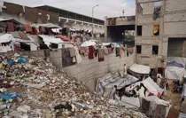 Gazze'de çöplükte yaşamak zorunda kalan Filistinliler, savaşın hâlâ sürdüğünü söyledi