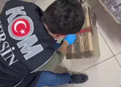 >Mersin'de kolilere gizlenmiş kaçak 459 parfüm ele geçirildi