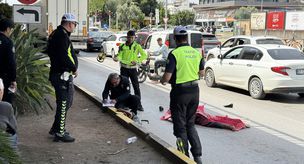 A woman selling handkerchiefs by the roadside lost her life under a truck.
