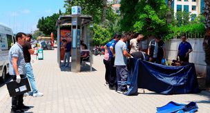 He was found dead on the bench at the bus stop.