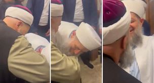 Yusuf Ziya Gümüşel, who was released, kissed Cübbeli Ahmet's hand.